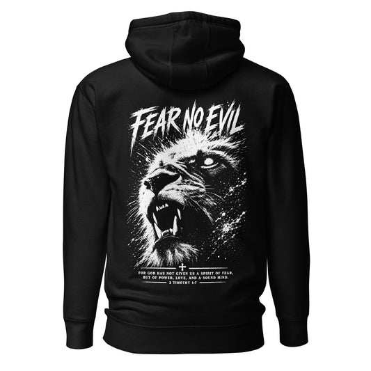 Black Christian pullover hoodie featuring a dramatic white roaring lion illustration with sharp fangs, distressed Fear No Evil lettering, and 2 Timothy 1:7 scripture beneath the artwork. Bold high-contrast Lion of Judah-inspired back design.
