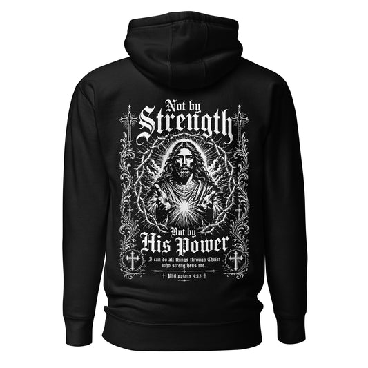 Black Christian pullover hoodie featuring an intricate white gothic illustration of Jesus Christ with outstretched hands, radiant light, a crown-of-thorns frame, ornate crosses, and decorative Victorian-style flourishes. Bold "Not by Strength But by His Power" lettering with Philippians 4:13 scripture on the back.